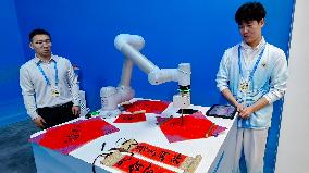Robots Welcome World Media At The SCO - Tianjin