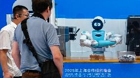 Robots Welcome World Media At The SCO - Tianjin