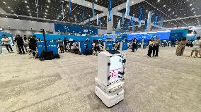 Robots Welcome World Media At The SCO - Tianjin