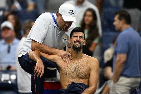 US Open - Novak Djokovic Gets Medical Treatment