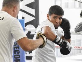 Boxing: Akhmadaliev opens training to media