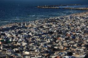 Displaced Palestinians On Al-Rasheed Street - Gaza City
