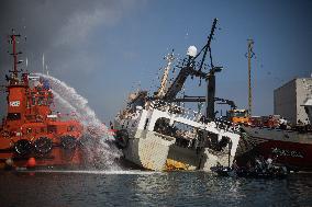 A Ship Continues To Burn In The Port Of Ribeira - Spain
