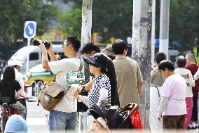 Citizens Watch Military Parade Aircraft in Beijing