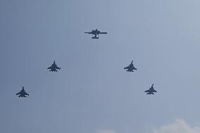 Citizens Watch Military Parade Aircraft in Beijing