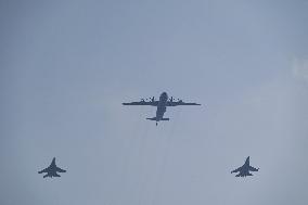 Citizens Watch Military Parade Aircraft in Beijing