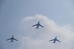 Citizens Watch Military Parade Aircraft in Beijing
