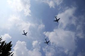 Citizens Watch Military Parade Aircraft in Beijing