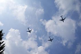 Citizens Watch Military Parade Aircraft in Beijing