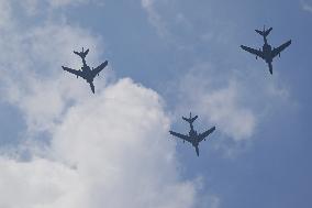 Citizens Watch Military Parade Aircraft in Beijing