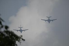 Citizens Watch Military Parade Aircraft in Beijing