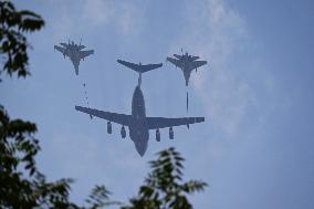 Citizens Watch Military Parade Aircraft in Beijing