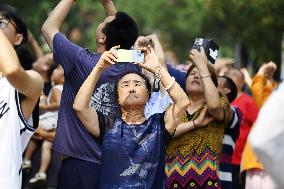 Citizens Watch Military Parade Aircraft in Beijing