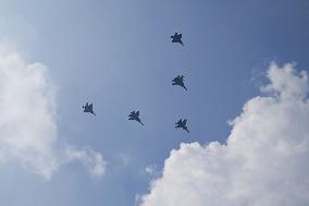 Citizens Watch Military Parade Aircraft in Beijing