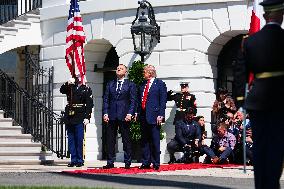 Trump greets President Karol Nawrocki of Poland on the South Portico of the White House
