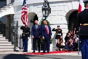 Trump greets President Karol Nawrocki of Poland on the South Portico of the White House