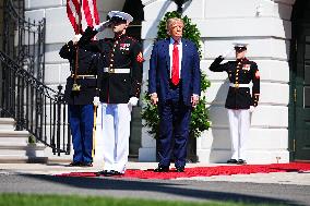 Trump greets President Karol Nawrocki of Poland on the South Portico of the White House