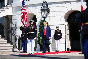 Trump greets President Karol Nawrocki of Poland on the South Portico of the White House