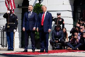 Trump greets President Karol Nawrocki of Poland on the South Portico of the White House