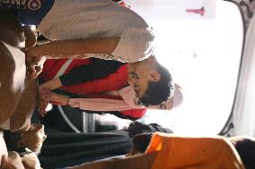 Syrian Red Crescent Volunteers Training Children In First Aid At Damascus International Fair