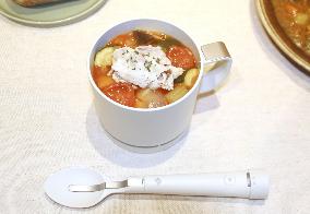 Cup and spoon to enhance salty taste