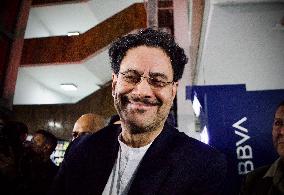 Supporters Hold Masks of Former President Alvaro Uribe During Trial in Bogota