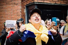 Supporters Hold Masks of Former President Alvaro Uribe During Trial in Bogota