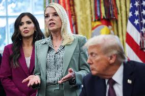 DC: President Trump Signs a Presidential Memorandum in Oval Office