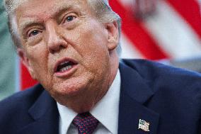 DC: President Trump Signs a Presidential Memorandum in Oval Office