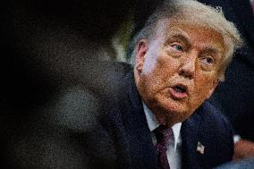 DC: President Trump Signs a Presidential Memorandum in Oval Office