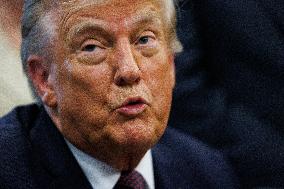 DC: President Trump Signs a Presidential Memorandum in Oval Office