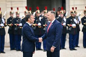 Emmanuel Macron welcomes President of the Republic of Poland Karol Nawrocki at the Elysee FA