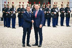 Emmanuel Macron welcomes President of the Republic of Poland Karol Nawrocki at the Elysee FA