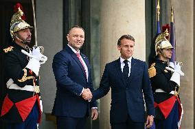 Emmanuel Macron welcomes President of the Republic of Poland Karol Nawrocki at the Elysee FA