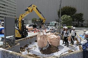 Fukushima soil used for METI flower bed