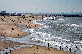 Beachgoers Enjoy Late Summer Warm Weather - Netherlands