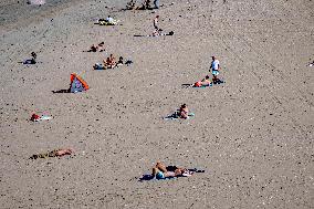 Beachgoers Enjoy Late Summer Warm Weather - Netherlands
