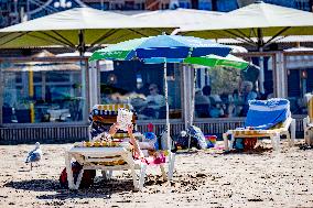 Beachgoers Enjoy Late Summer Warm Weather - Netherlands