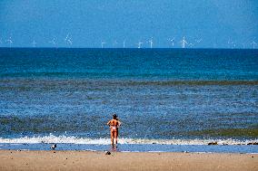 Beachgoers Enjoy Late Summer Warm Weather - Netherlands