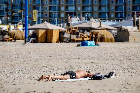Beachgoers Enjoy Late Summer Warm Weather - Netherlands