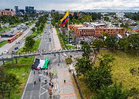 Pro-Palestine Demonstrators Carry Flag Across Bogota