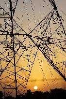 Workers Are Installing a High-Voltage Electricity Pylon - India