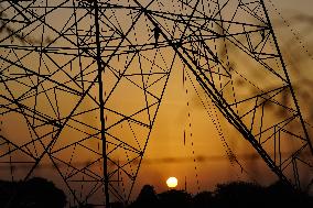 Workers Are Installing a High-Voltage Electricity Pylon - India