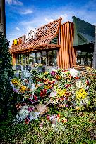 Flowers At McDonald's Where 15-Year-Old Was Killed By Police - Netherlands