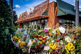 Flowers At McDonald's Where 15-Year-Old Was Killed By Police - Netherlands