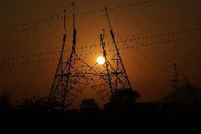 Workers Are Installing a High-Voltage Electricity Pylon - India