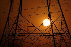 Workers Are Installing a High-Voltage Electricity Pylon - India
