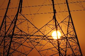Workers Are Installing a High-Voltage Electricity Pylon - India