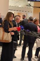 Carla Bruni Grabs The Windscreen Of A Mediapart Microphone