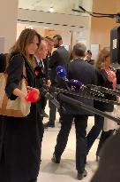 Carla Bruni Grabs The Windscreen Of A Mediapart Microphone